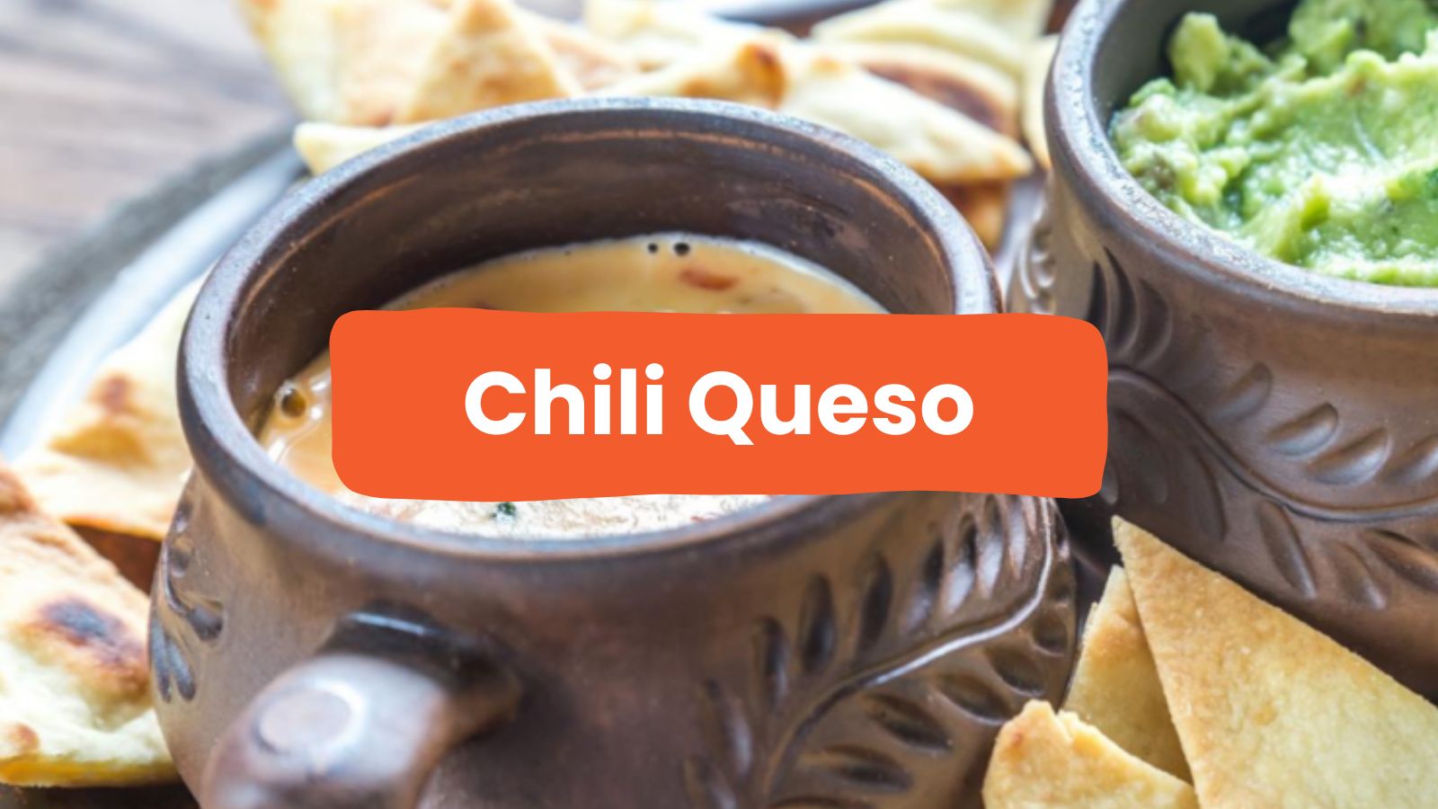 crock of queso with guacamole and chips
