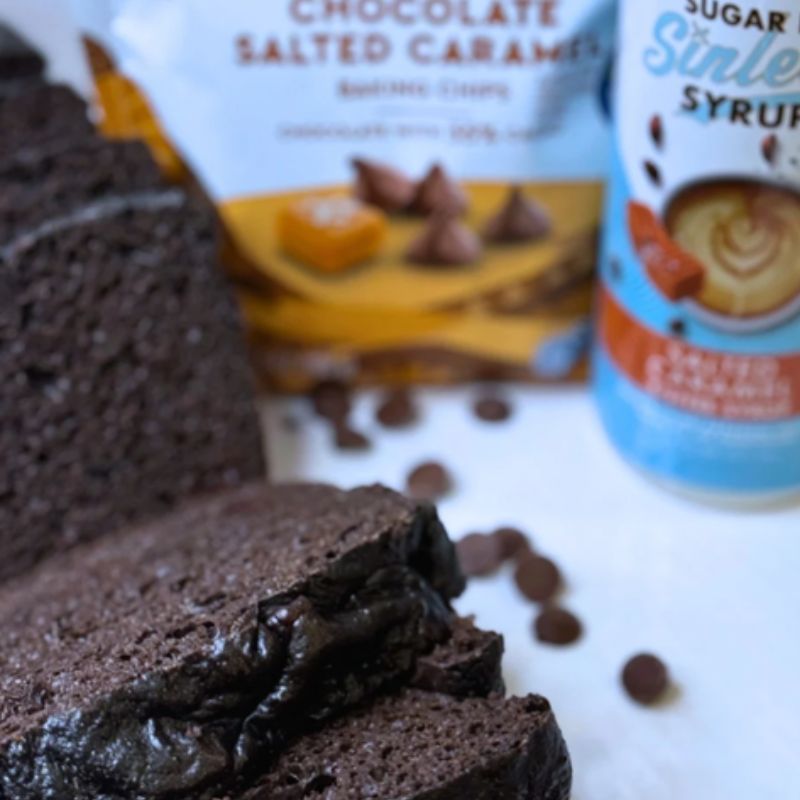 Chocolate protein bread and Salted Caramel syrup bottle on white background
