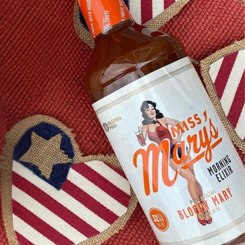 closeup of Miss Mary's Original Bloody Mary Mix on red, white, and blue background