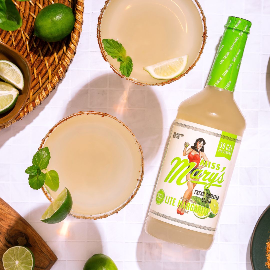 bottle of Lite Margarita Mix and festive margaritas