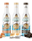 Fireside Favorites trio of sugar-free coffee syrups-hazelnut, toasted marshmallow, and salted dark chocolate flavors on a white background.