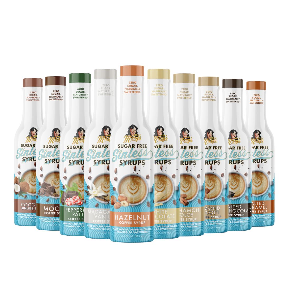 Hazelnut syrup in row of various Sinless Syrup flavors on a white background