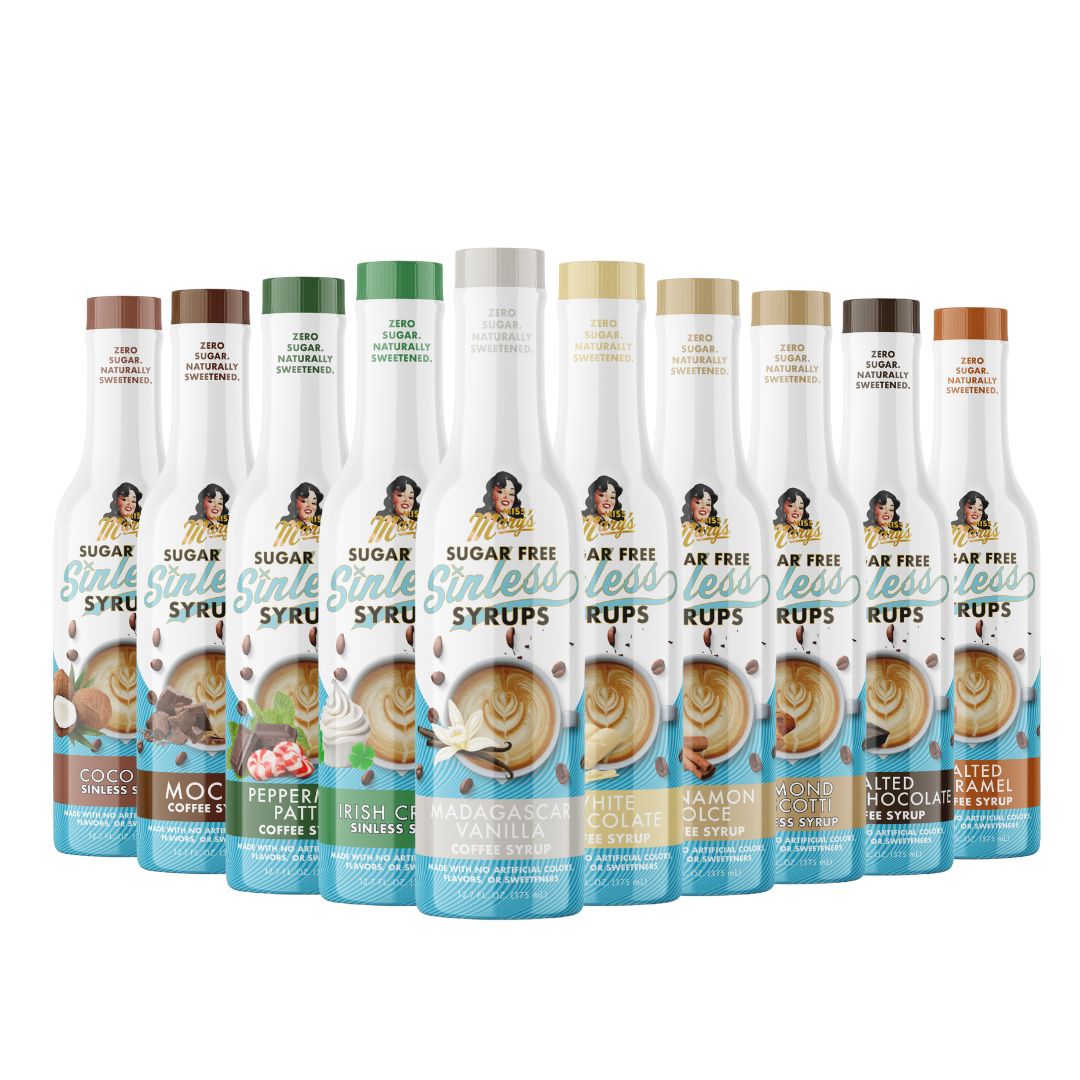 Madagascar Vanilla syrup in row of Sugar Free Sinless Syrup bottles with various flavors on a white background