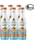 Six bottles of Sugar Free Sinless Syrups salted caramel flavor on a white background.