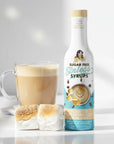 Toasted Marshmallow Sinless sugar free coffee Syrup bottle and marshmallows on white background