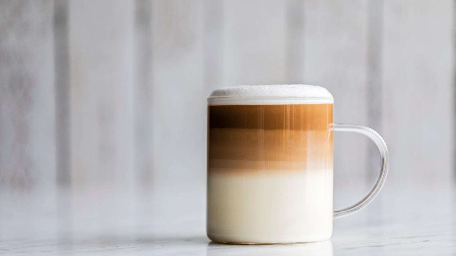 Closeup of a macciato with heavy cream