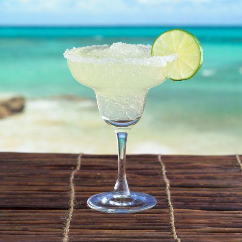 frozen margarita against blue water