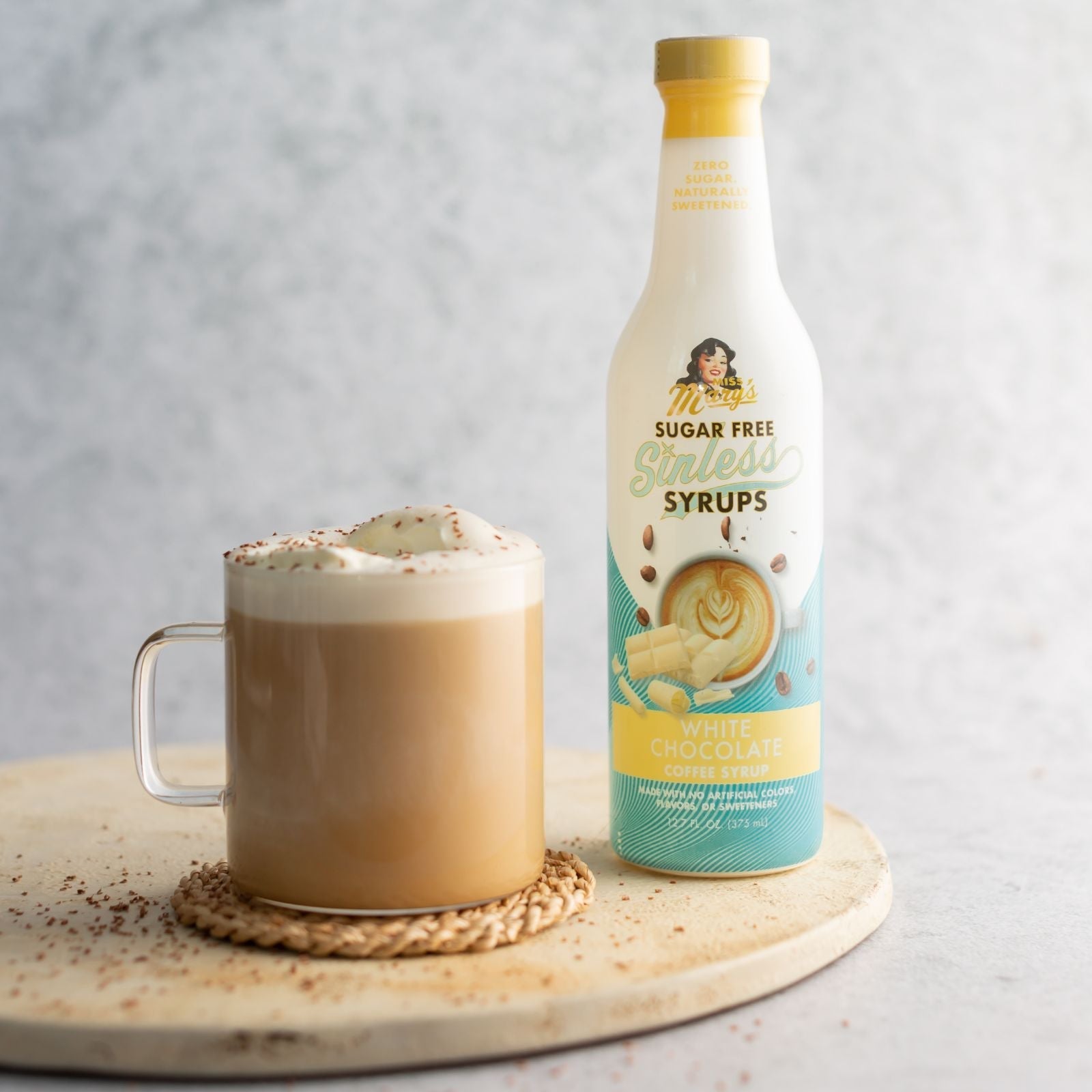 White chocolate mocha with White Chocolate Sinless Syrup coffee syrup on grey background