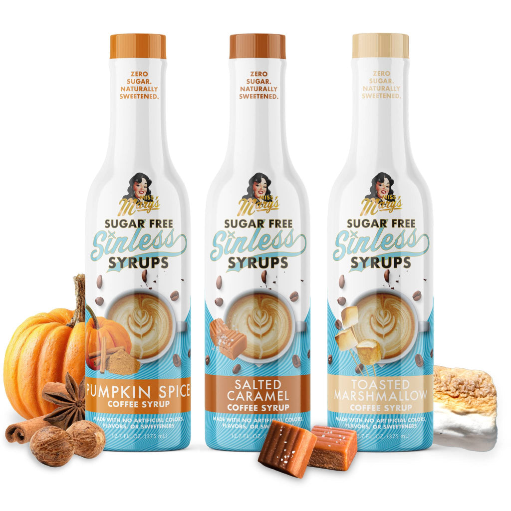 Three bottles of sugar-free coffee syrups with pumpkins, caramel, and marshmallows on a white background.