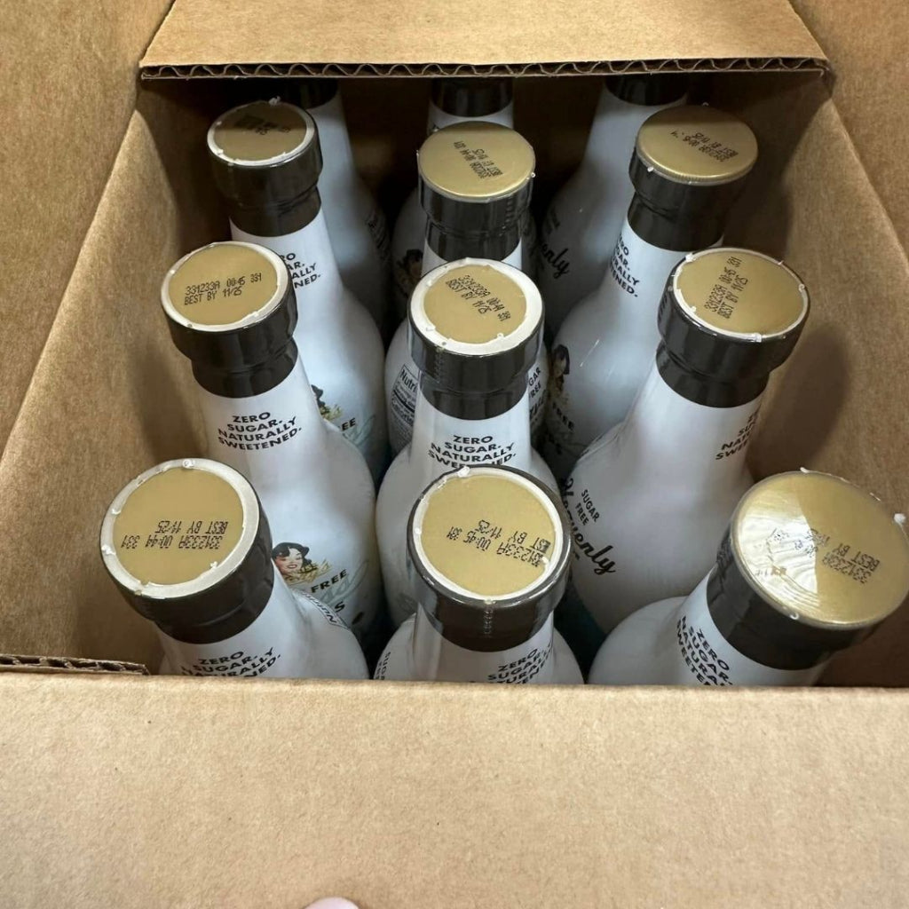 A case of Salted Dark Chocolate Sugar Free Sinless Syrup bottles ready to ship.
