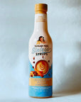 Miss Mary's Cinnamon Dolce Sugar Free Sinless Syrup bottle on blue background