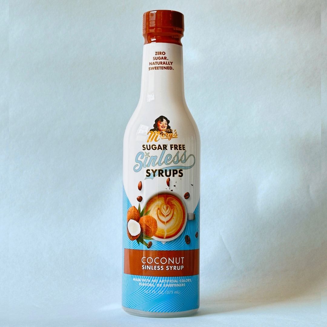 Miss Mary's Coconu Sugar Free Sinless Syrup bottle against blue background