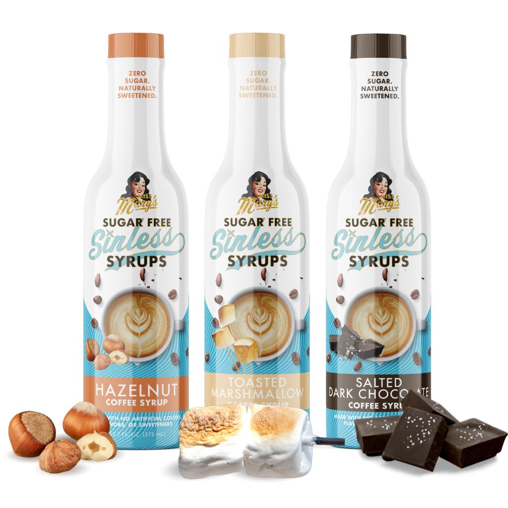 Fireside Favorites trio of sugar-free coffee syrups-hazelnut, toasted marshmallow, and salted dark chocolate flavors on a white background.