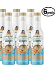 Six bottles of Sugar Free Sinless Syrups Almond Biscotti flavor on a white background.