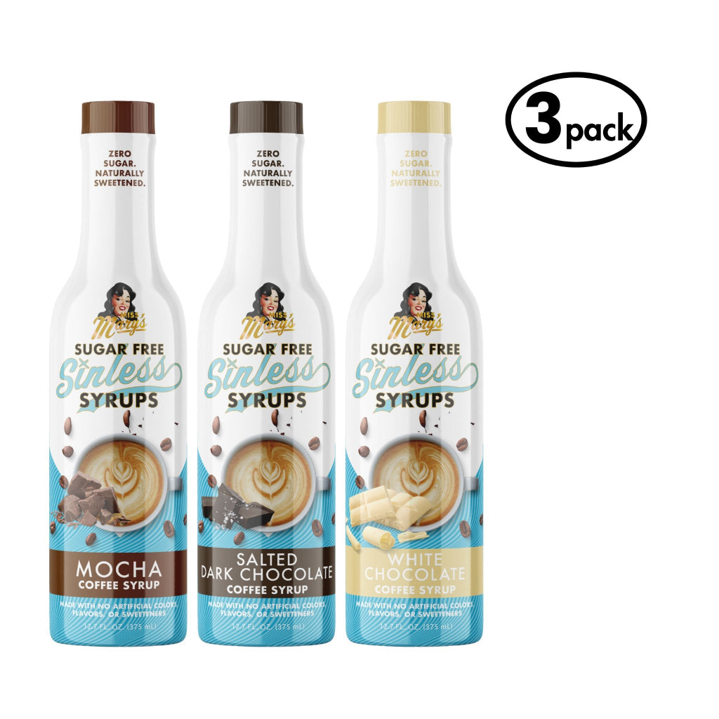 Three bottles of sugar-free syrups with different flavors on a white background