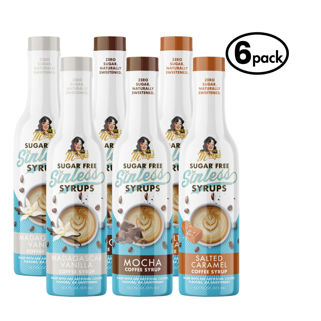 Six bottles of sugar-free syrups with different flavors on a white background