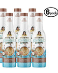 Six bottles of Sugar Free Sinless Syrups with a coconut flavor on a white background.