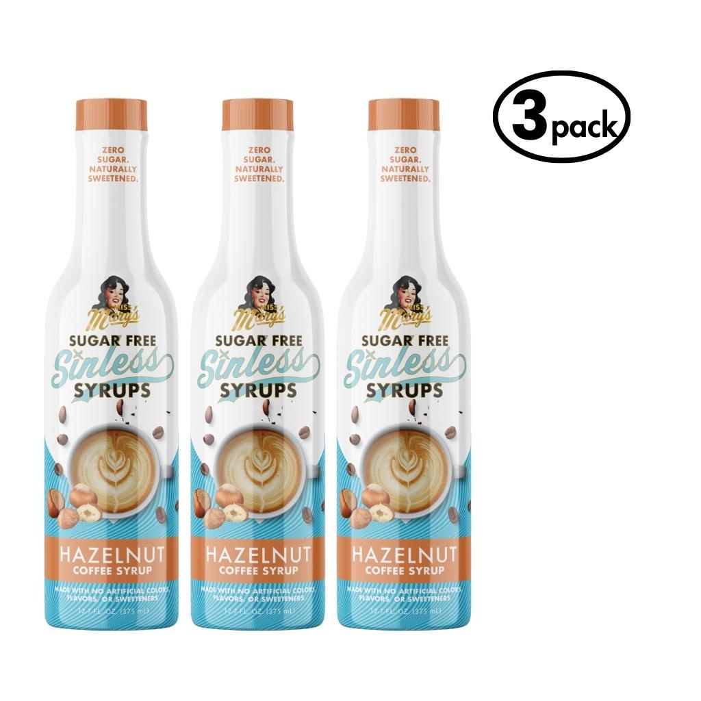 Three bottles of Sugar Free Sinless Syrups Hazelnut Coffee Syrup on a white background