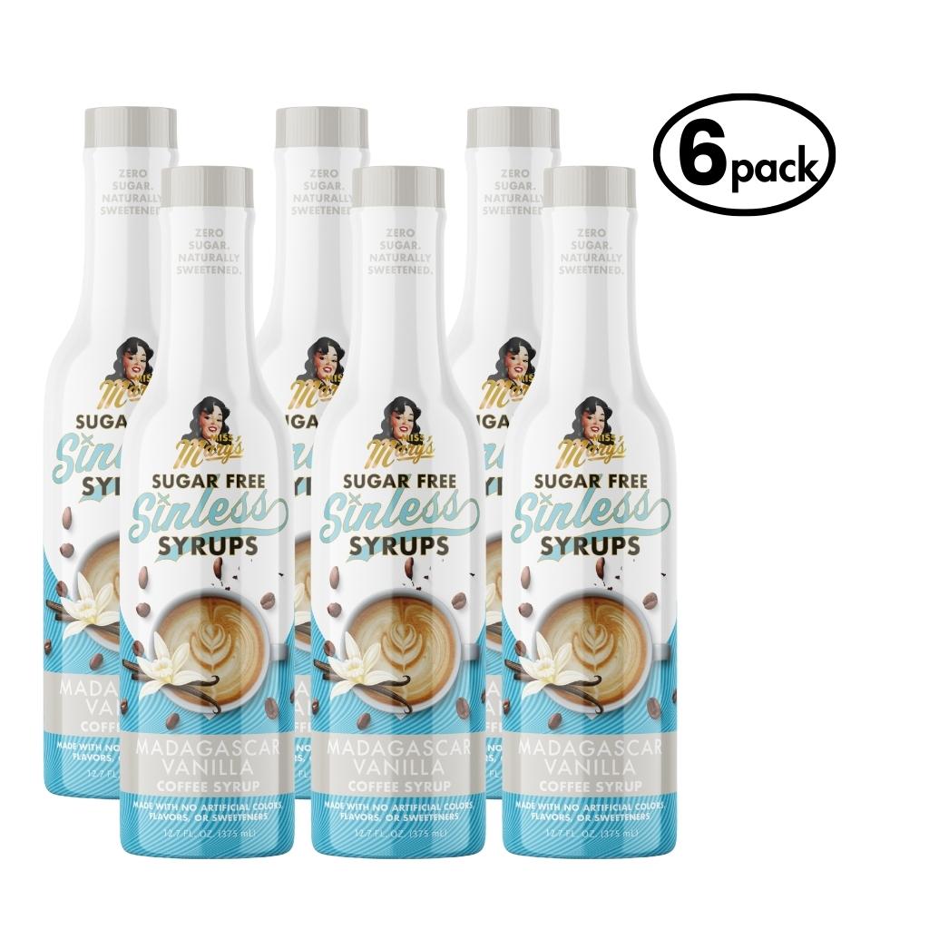 Six bottles of Sugar Free Sinless Syrups with Madagascar Vanilla flavor on a white background.