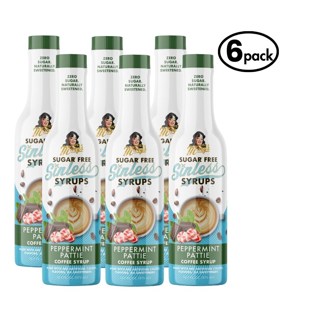 Six bottles of Sugar Free peppermint pattie Sinless Syrups on a white back background.