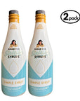 Two bottles of Sugar Free Sinless Simple Syrups on a white background