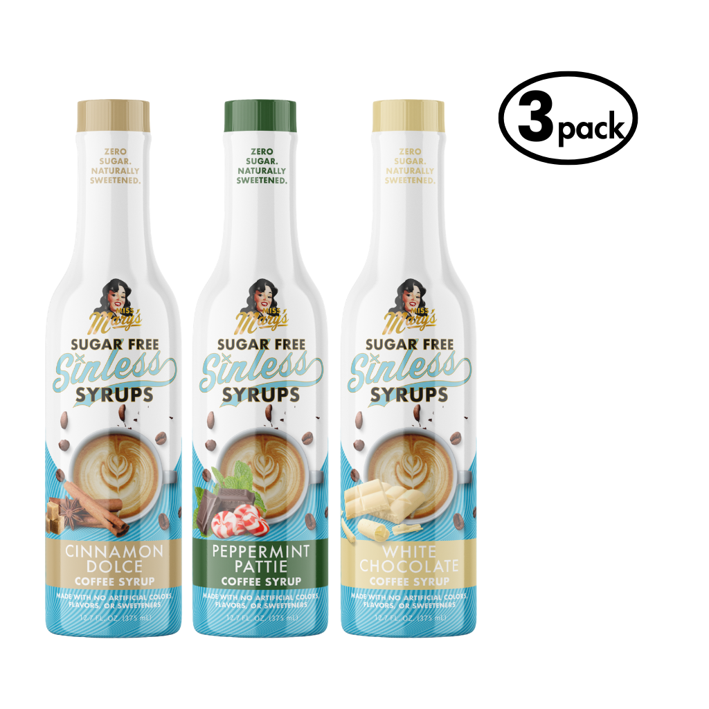 Three bottles of sugar-free syrups with labels for cinnamon dolce, peppermint patty, and white chocolate on a white background.