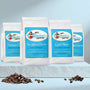 Four packages of Sinless Coffee with coffee beans on a light blue background