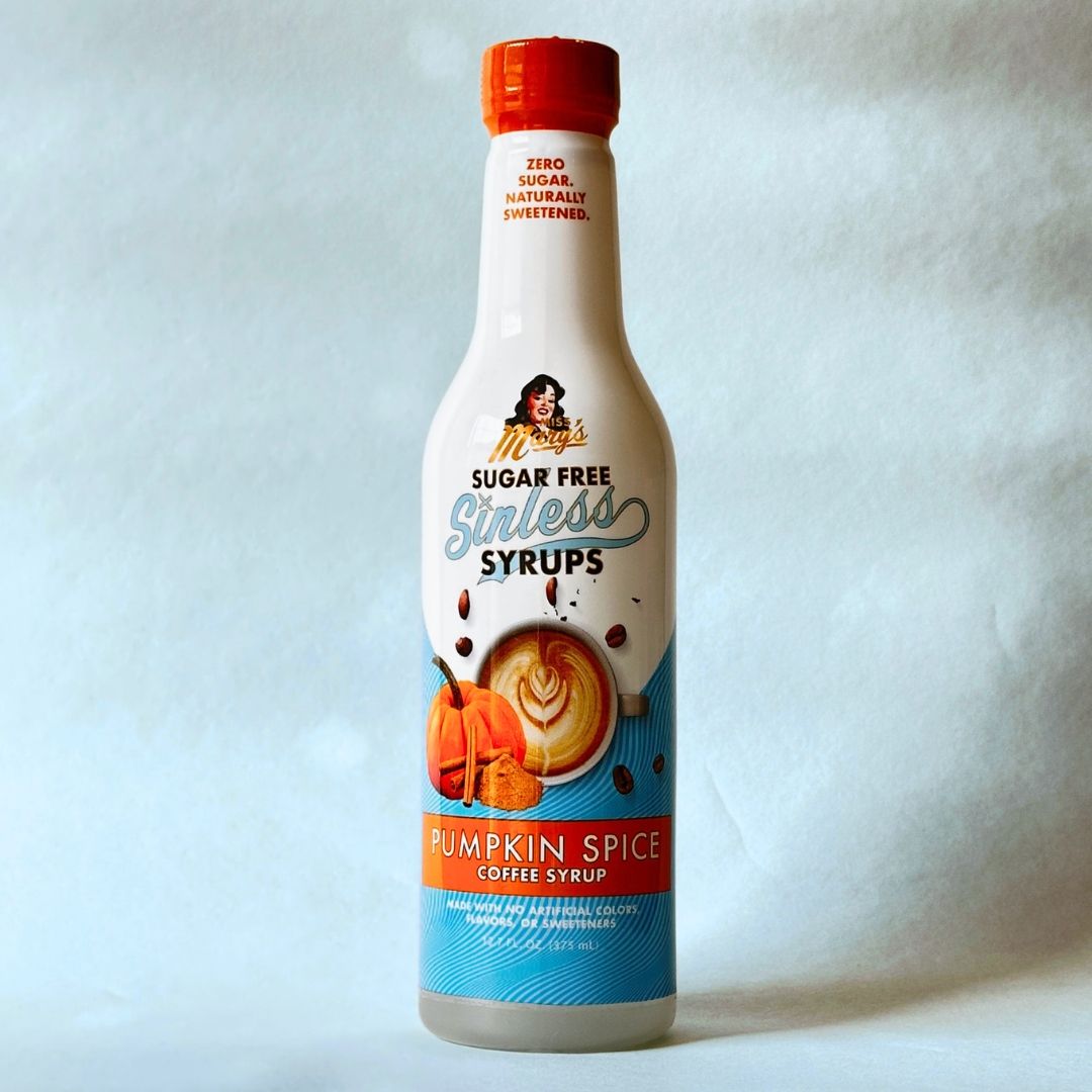 Miss Mary's Pumpkin Spice Sugar Free Sinless Syrup bottle on blue background