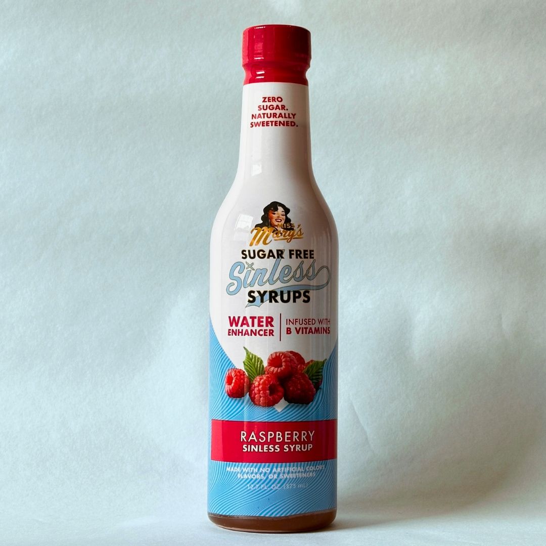 Miss Mary's Raspberry Sugar Free Sinless Syrup bottle on blue background