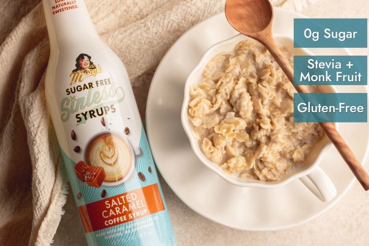Bottle of Sugar-free Salted Caramel coffee syrup and a bowl of oatmeal on a light brown background.