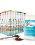 Collection of sugar-free syrup bottles and a bag of Guatemalan Spring coffee on a white background