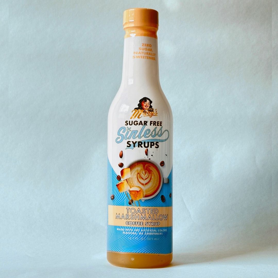 Miss Mary's Toasted Marshmallow Sugar Free Sinless Syrup bottle on blue background