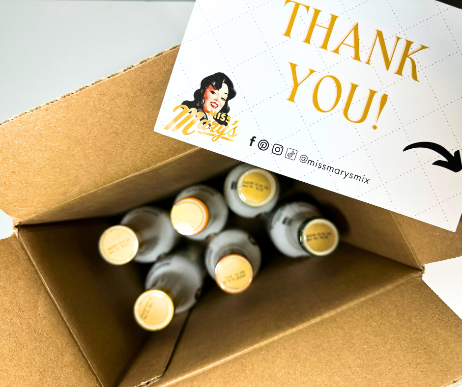 Sinless Syrups Custom Collection inside a box with a thank you card from Miss Mary's Mix.