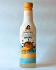 Miss Mary's White Chocolate Sugar Free Sinless Syrup bottle on blue background